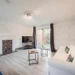 Spacious 4-Bed Home With Garden & Free Parking