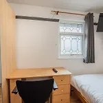 Spacious 4-Bed Home With Garden & Free Parking